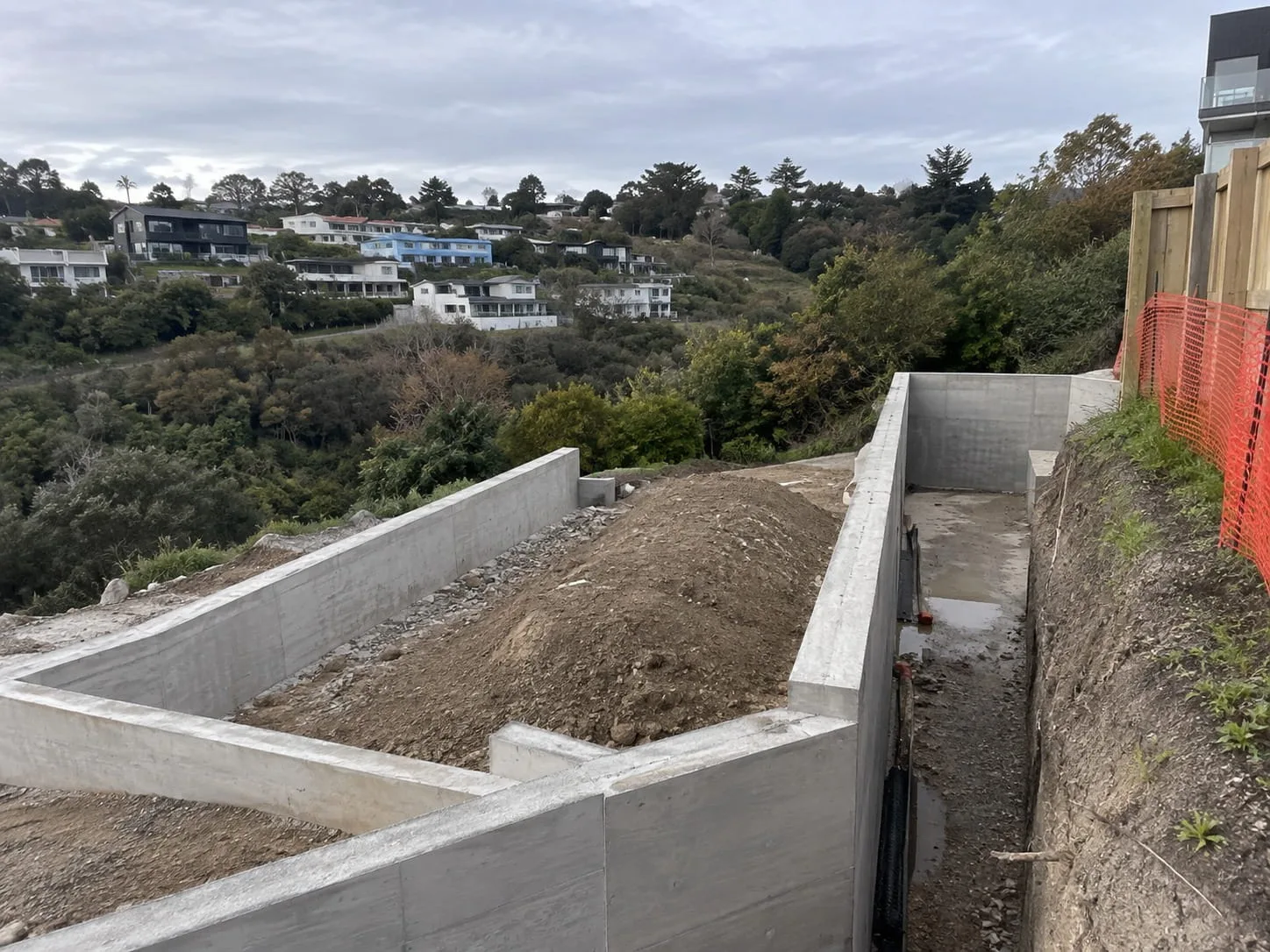 Poured concrete retaining wall on a Christchurch property